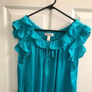 Rarely worn, silky top w ruffles. Size XL